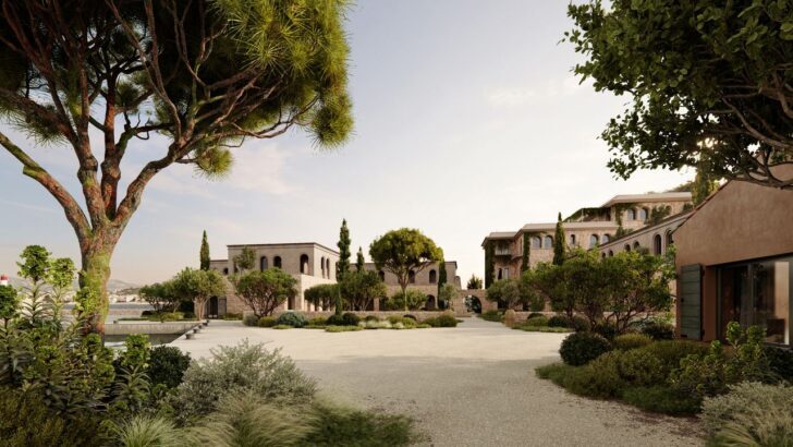 Vista de un hotel lujoso con jardines y arquitectura mediterránea